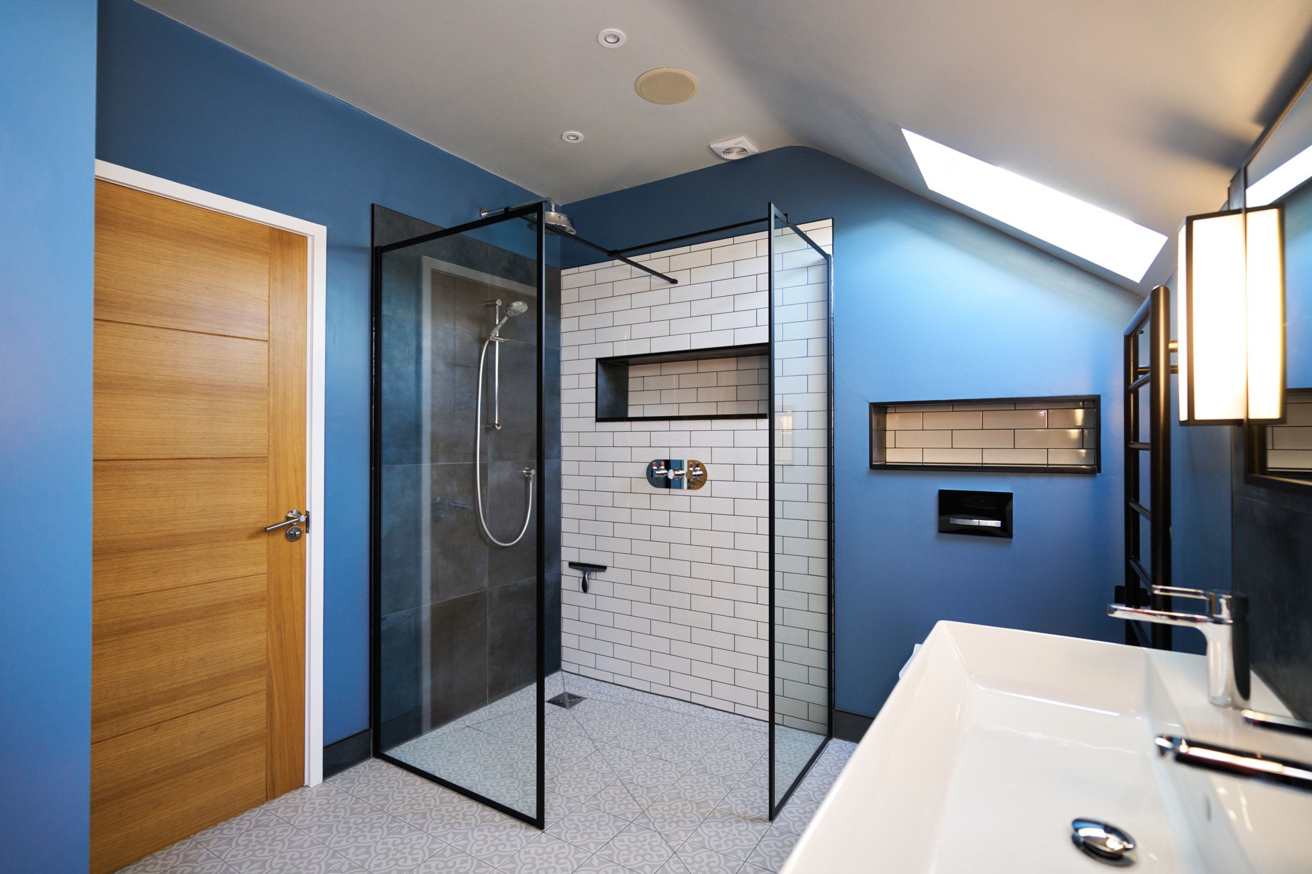 Walk In Shower with Black Crittle Shower Enclosure and White Brick Tiles