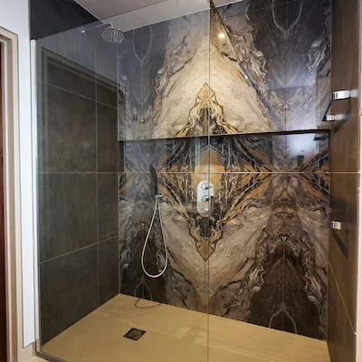 The book matched porcelain tiles in this bespoke bathroom design in East Chiltington certainly create a unique design detail. These tiles are ordered for the specific application and then the tiler has just one chance to ensure each tile is fitted to perfection. We are sure you will agreed the installation is flawless and the finished effect is a very special shower area. :))))))

#BespokeBathroomDesign #BookMatchedTiles #LuxuryBathrooms #EastChiltington #PorcelainTiles #BathroomInspo #ShowerDesign #TilePerfection #FlawlessFinish #BathroomGoals #ModernBathroom #StatementShower #BathroomInstallation #DesignDetails #BrightonBathrooms @thebrightonbathroomcompany @thebrightonbathroomco
