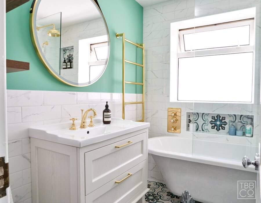 White Bathroom Vanity with Gold Handles and Taps