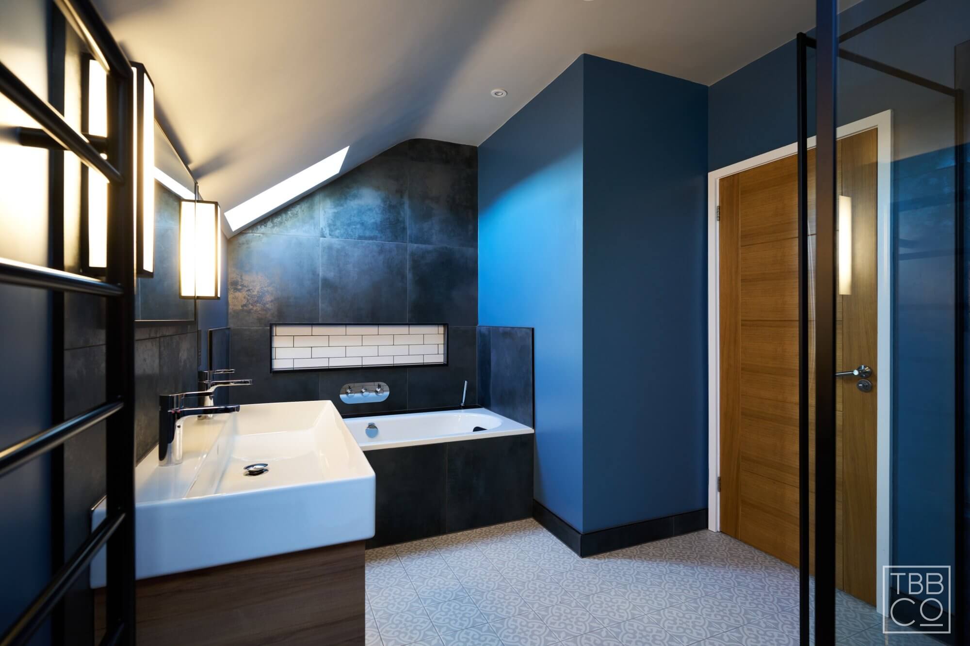 Blue and Black Bathroom Design with Crittle Shower Enclosure