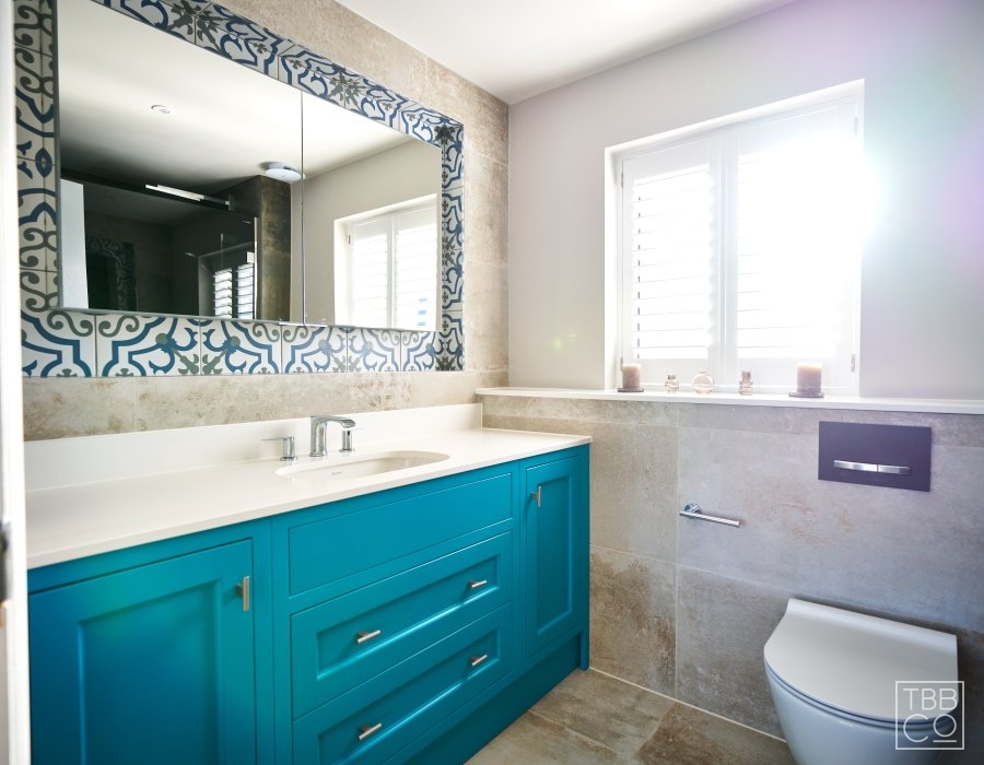 Bright blue bathroom vanity